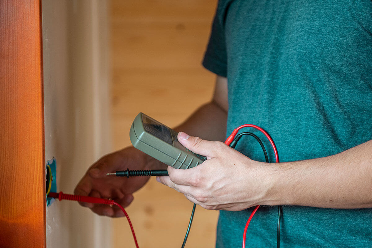 electrician testing voltage