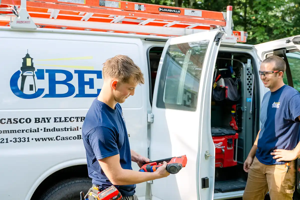 CBE electricians preparing with van doors open